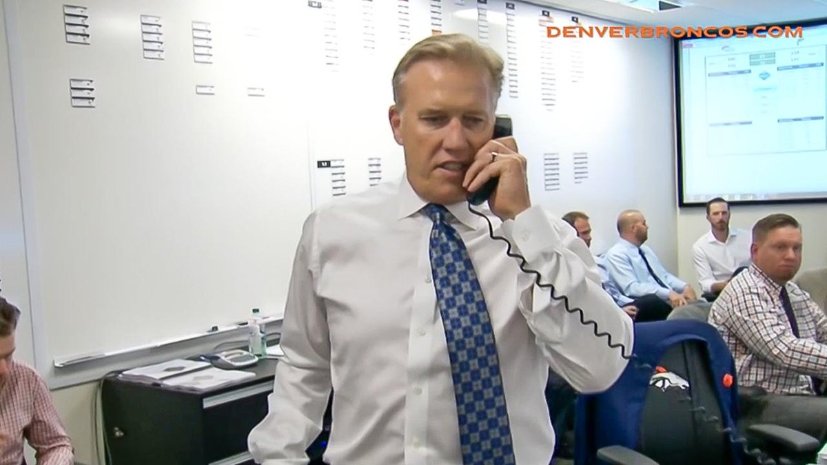 Broncos's tweet photo. "Jeff — John Elway. How you doing?"

Watch as @JHeuerman86 learns he's a #Bronco: [http://t.co/ntKpUwoc7r] http://t.co/axRo9NOani