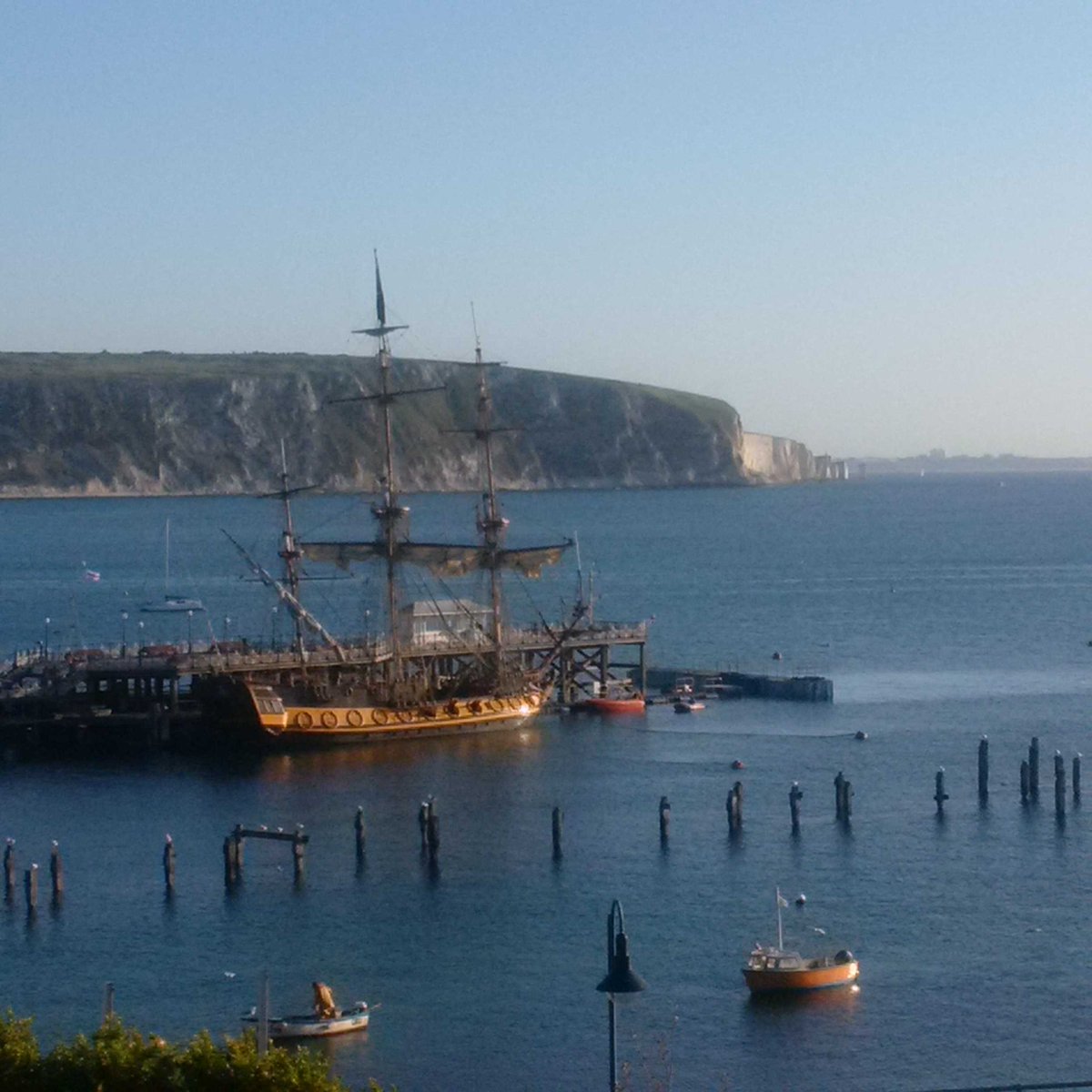 #Swanage bay at its glorious best this morning complete with #PeterPan pirate ship! #Purbeck #Dorset