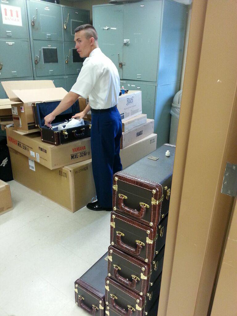 13thArmyBand's tweet image. SPC Rivero inspects a new #trumpet .  #guardexperience #armybands