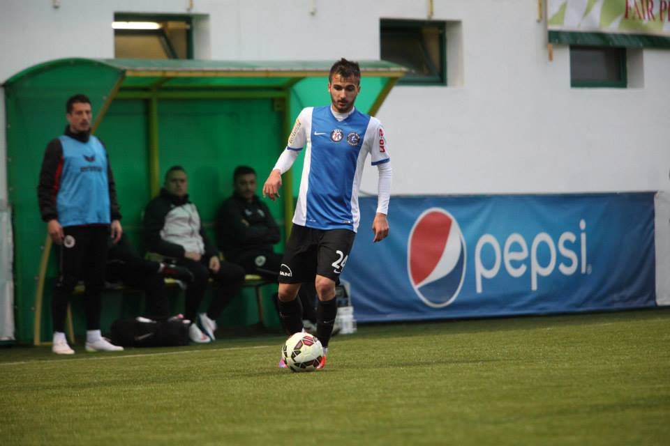 Nikolov controls the ball