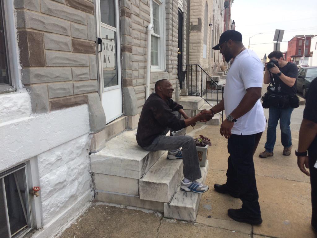 Ravens's tweet photo. .@raylewis greets #Baltimore residents as he walks through the neighborhoods. #BaltimoreStrong http://t.co/cJPAOpPeIN