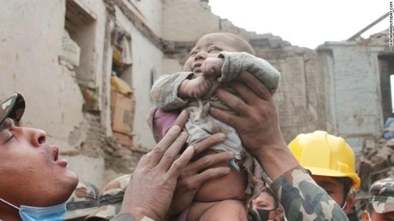 cnni's tweet photo. This baby was pulled from the Nepal earthquake rubble after 22 hours: http://t.co/5vPidm4Iaf http://t.co/k1sNwGbIHs