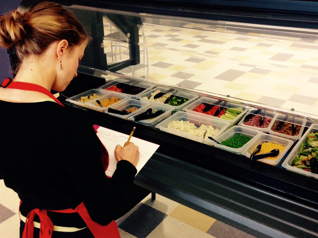 ehhdLT's tweet photo. Pre-lunch setup at Park HS. @ErinJackson9 draws salad bar while @carmenbyker &amp; Molly Stenberg weigh portion sizes http://t.co/uzbhskTw4f