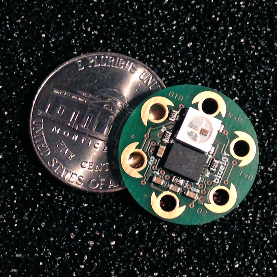 guido_burger's tweet photo. got to do a size comparison on sewable pico-Platinchen - smallest? #Arduino #9DOF @tindie @AtmelMakes @WearableTech http://t.co/kn6LN66CeE