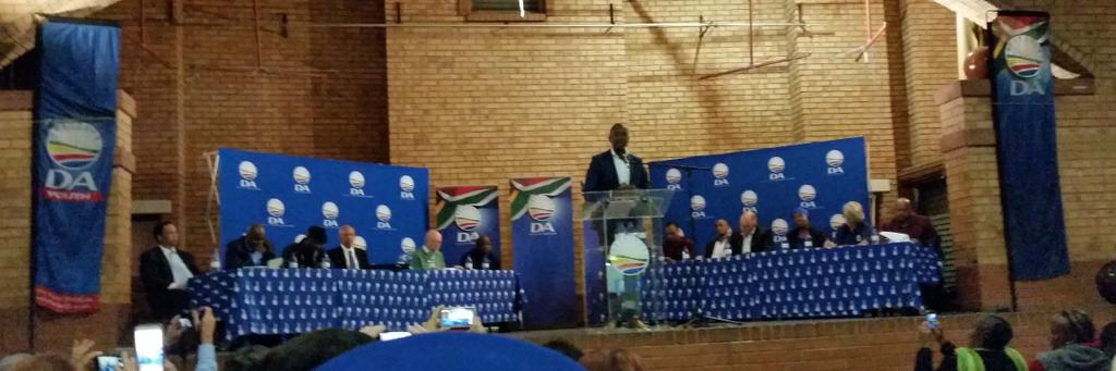 SteveMooreSA's tweet photo. #GPDebate @MmusiMaimane steps up to the stage. Massive cheers and Amandlas http://t.co/SAuMmy4Gx4
