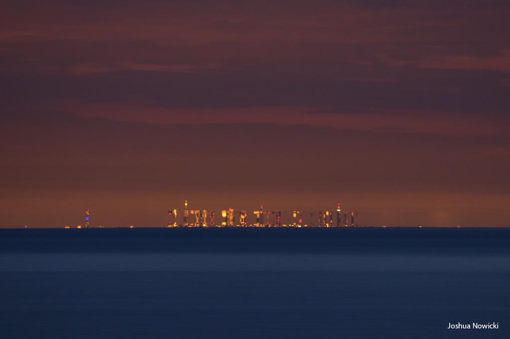 tracym's tweet photo. Incredible Lake Michigan mirage by @PureMichigan photog @StartVisiting. http://t.co/OP7dhqjycf http://t.co/j6XfGJUNP8