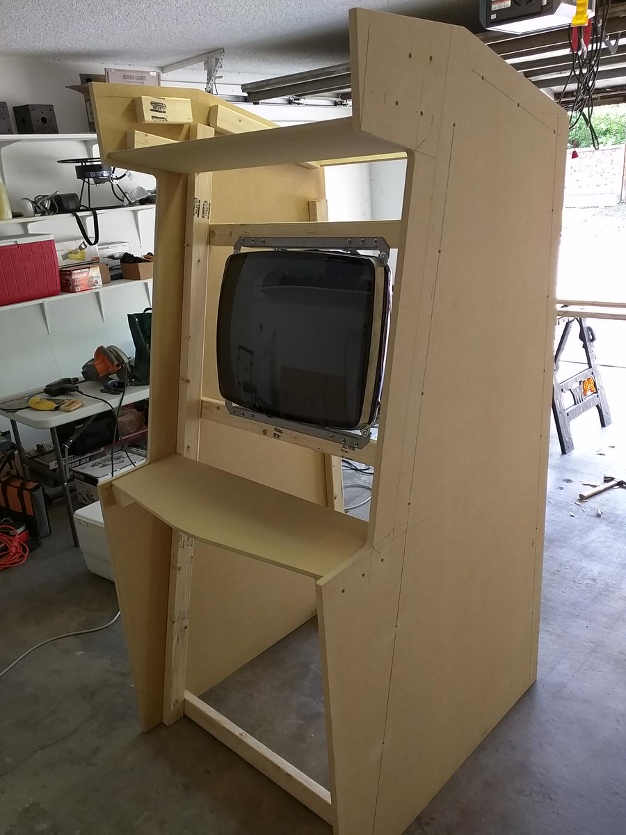 BRCade2015's tweet photo. Screen is mounted,  #BRCade is starting to take shape! #RocketScience15 @_BottleRocket http://t.co/z5Nq4hj9s2