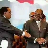 Senator_Baloch's tweet photo. Mugabe refused to shake hands with the Zulu King, bcz he passively watched his people killing their African brothers. http://t.co/y1MF7u3cir