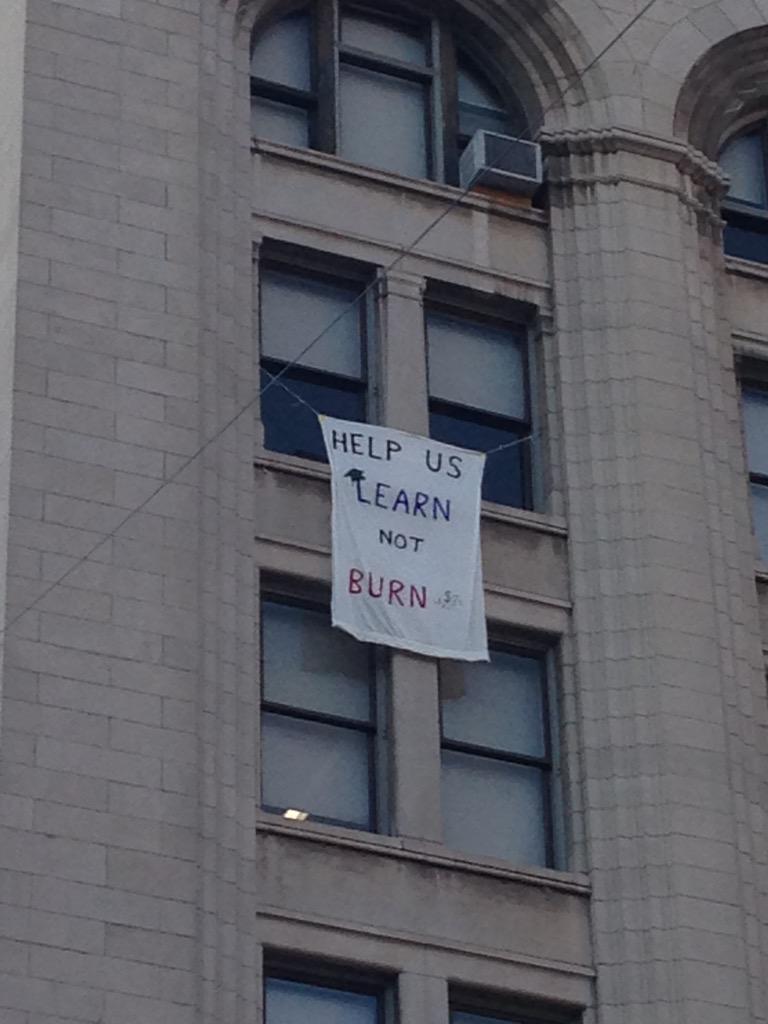 ru_rise's tweet photo. "Help us learn not burn" #RUStudentsFirst #NFLDraft http://t.co/uWswVgyK1m