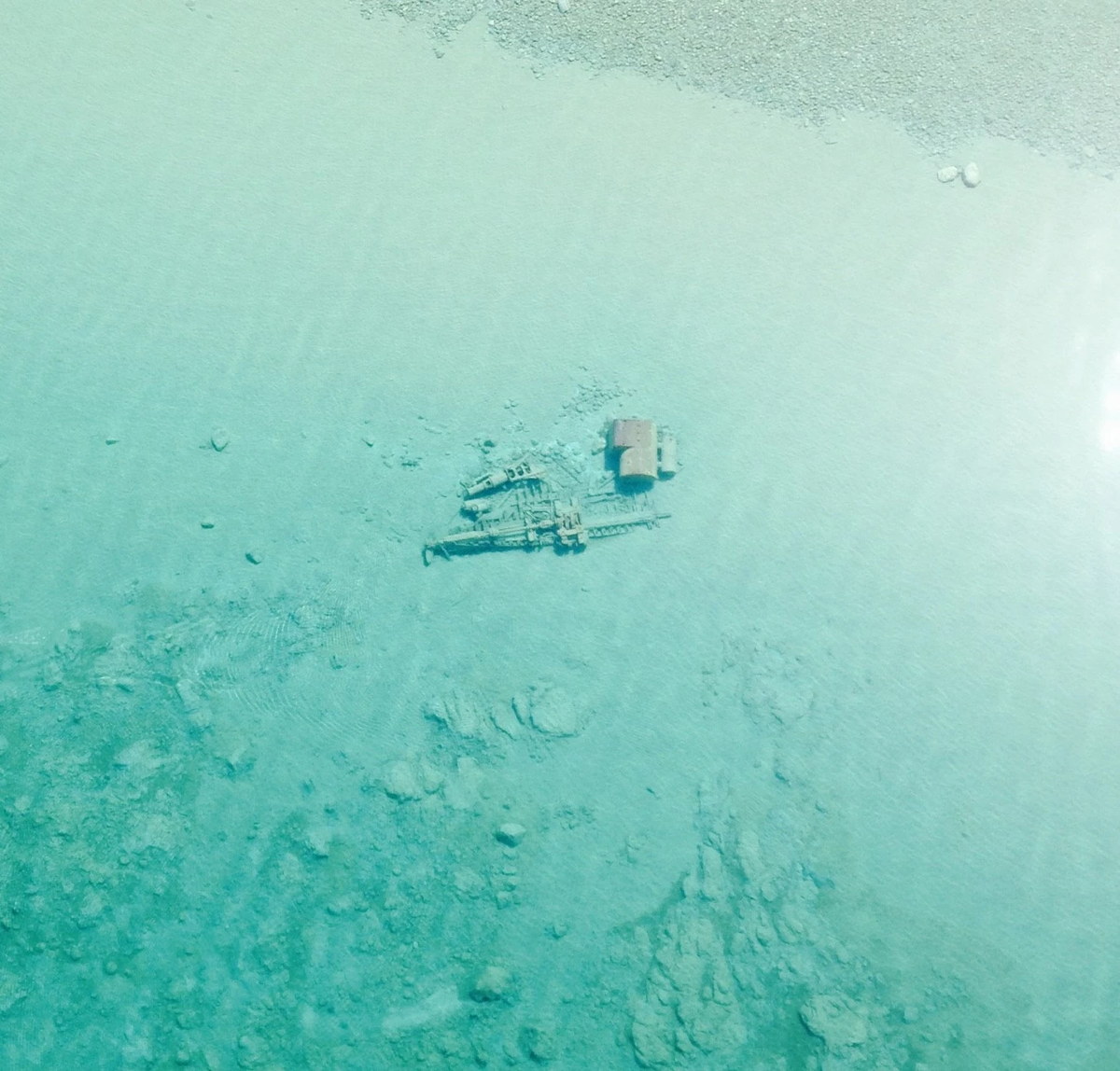 washingtonpost's tweet photo. Lake Michigan was so clear this month, you could see these shipwrecks from the air http://t.co/I4hP5lPrNe http://t.co/pJX3M3rUm4