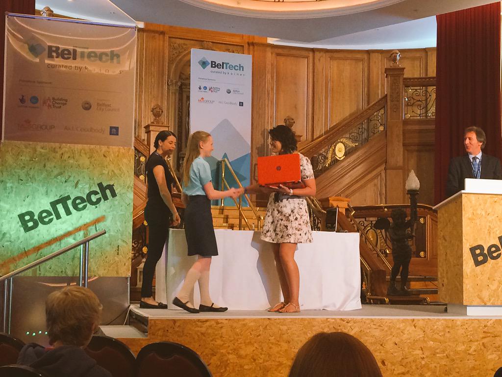 KainosSoftware's tweet photo. .@CrothersGemma presents the key stage 3 @GoBerserk1 award! Congratulations to all of today's winners at #BelTech15 http://t.co/Dj6MiT2Pf6
