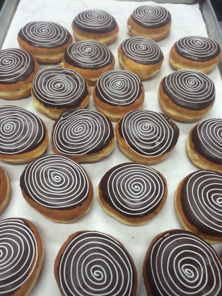 hugs_and_donuts's tweet photo. The @insomniaVGC donut starts today. Coffee cream with chocolate icing. It's what everybody needs to start the day. http://t.co/CLrYUz5pjw