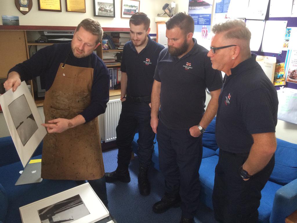 ChiswickRNLI's tweet photo. Jack from @ProjectLifeboat showing our crew some of the incredible photos he has taken of other @RNLI stations. http://t.co/COn9j9RUwk