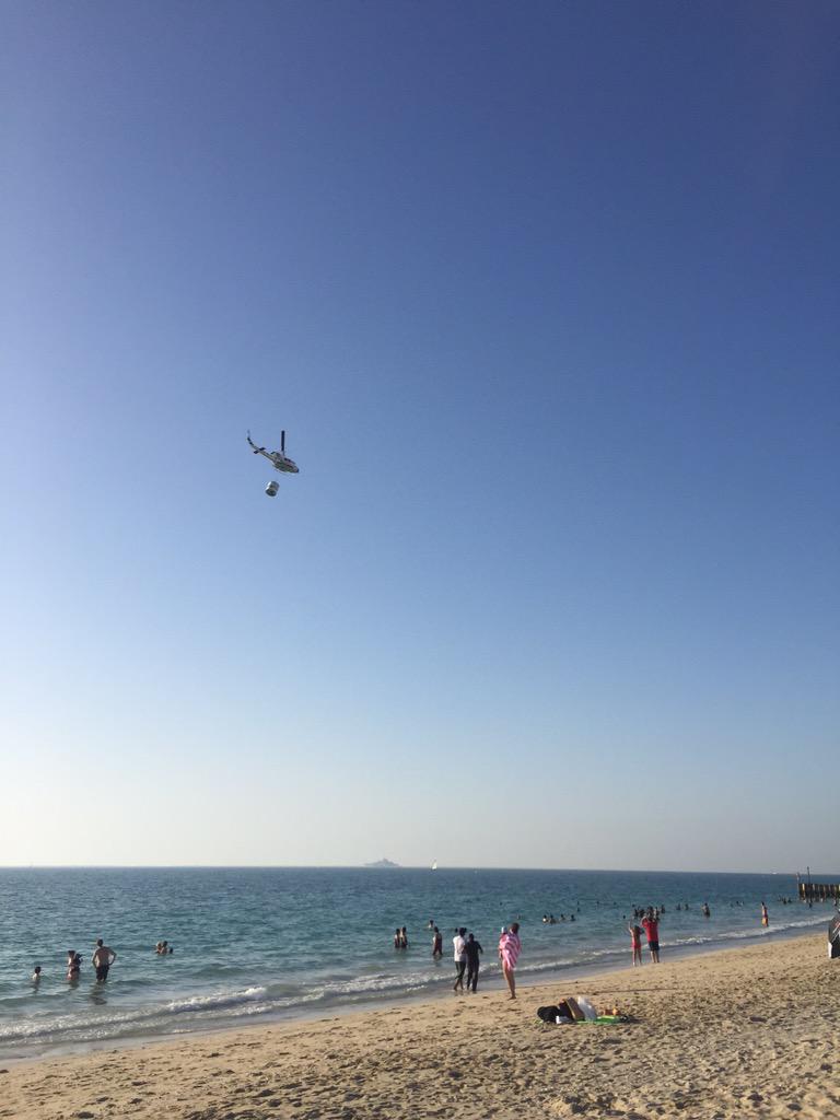 Mermaido3's tweet photo. #delivery #onthebeach #Dubai #beach #fun #helicopter http://t.co/Y7tplHzkks