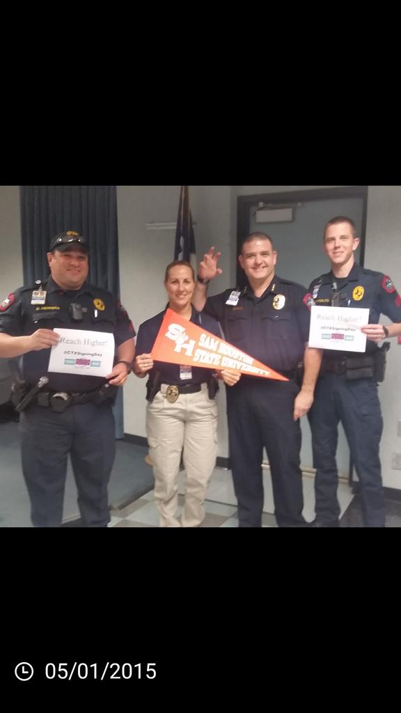 AISDPolice's tweet photo. #AISDProud Police supporting @CTXSigningDay. #ReachHigher #RockYourFuture #SHSU  #EatemUpKats http://t.co/xaHauXNK95
