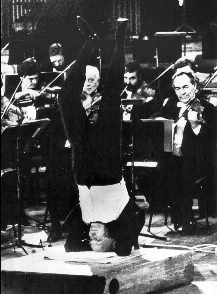 Yehudi Menuhin conducted Beethoven's fifth symphony for the Berlin Philharmonic Orchestra 1982 whilst doing Sirsasana