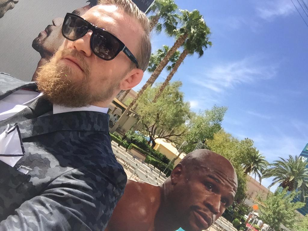SportsCenter's tweet photo. UFC's @TheNotoriousMMA stopped by the set in Vegas to join SC and predict that #MayweatherWins. http://t.co/H8nOopWu9b