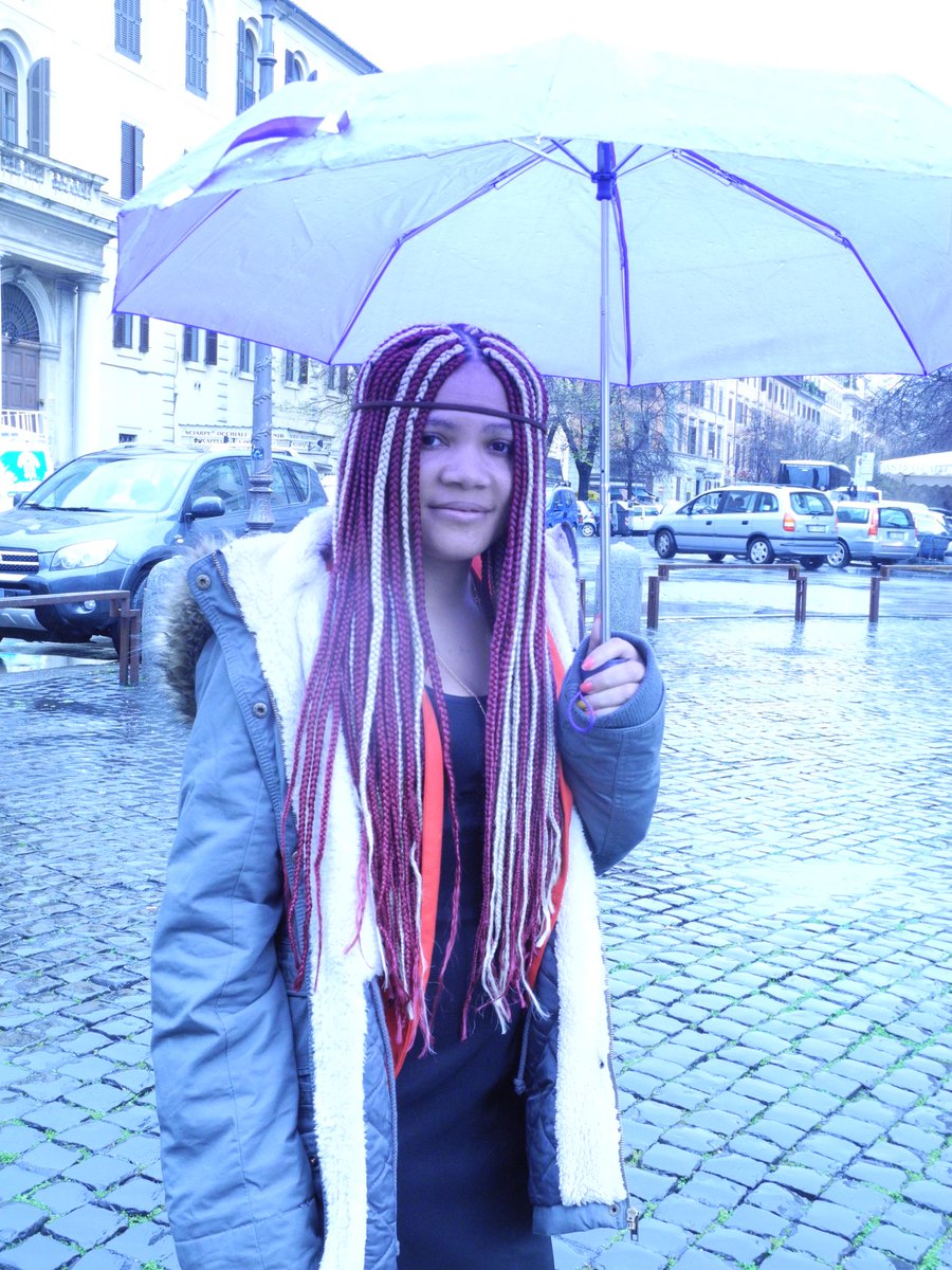 Just imagining how long it took to accomplish this hair style. Happy she allowed me to take her photo.