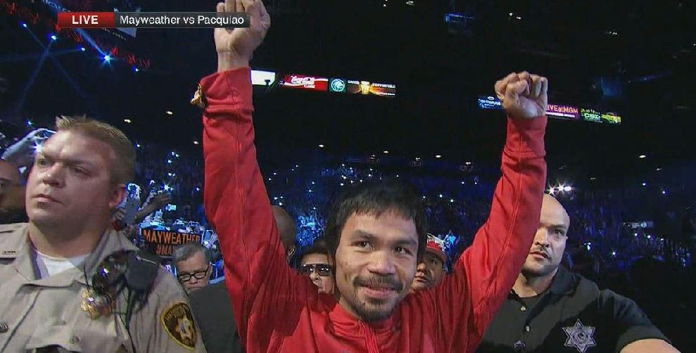 SportsCenter's tweet photo. Manny Pacquiao is all smiles as he makes his grand entrance for the weigh-in. #LIVEonSC http://t.co/KocY0Mw5mC