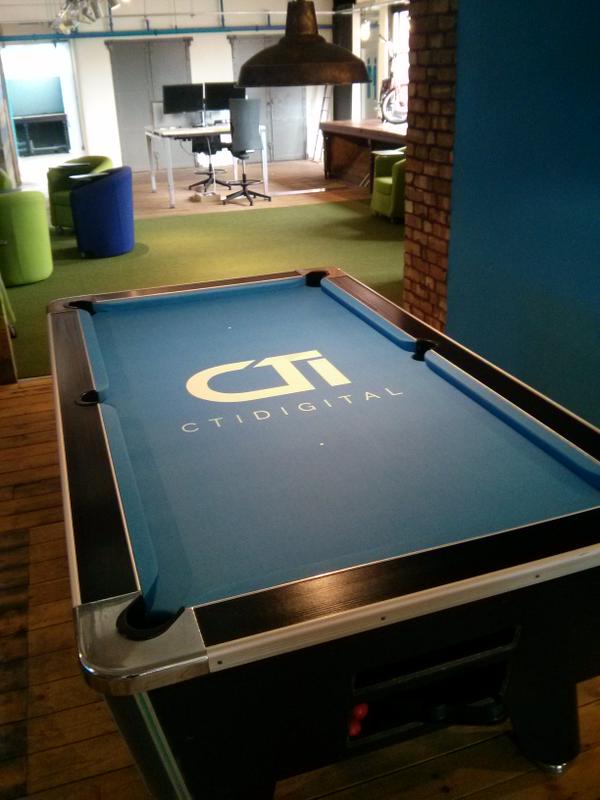 . @CTIDigitalUK 's logo cloth on their office table. Looks tidy! #manchester #pooltable