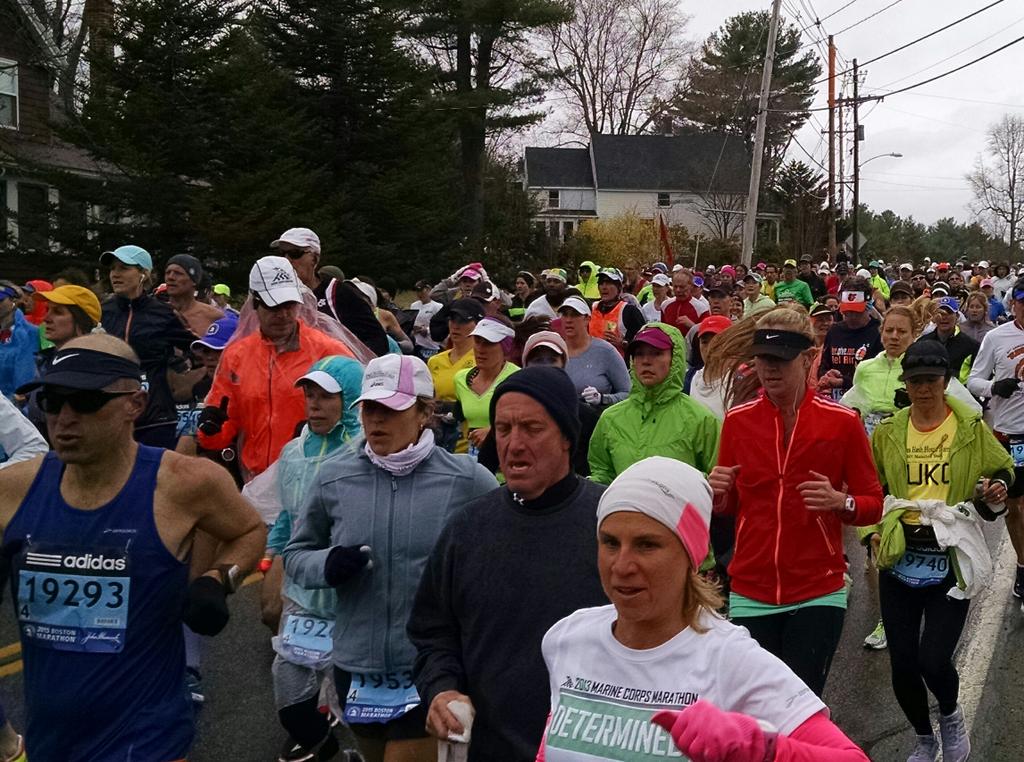 js_danford's tweet photo. Mile 1 of the #BostonMarathon in the books.  Cold rain is coming down.  Jill looked good.  #nashvilleclowns http://t.co/O5rEsWMgBX