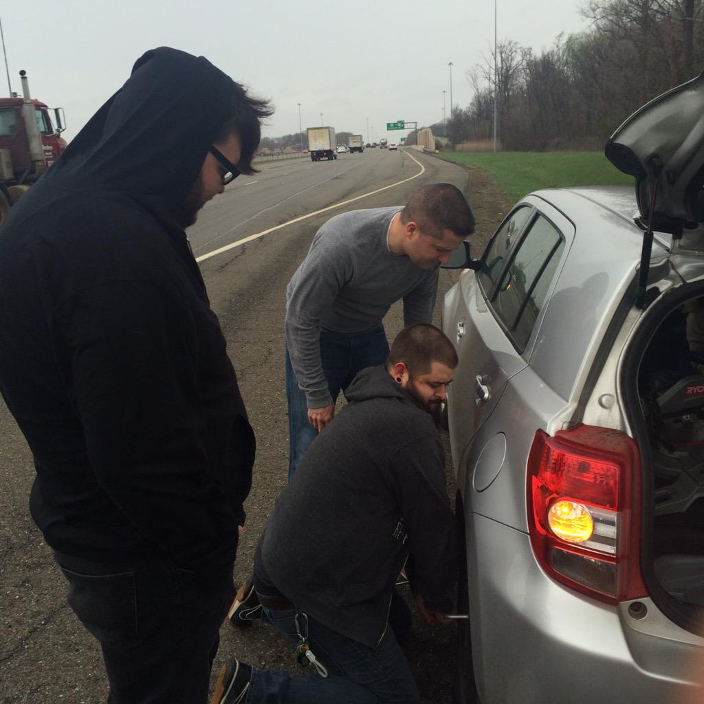 RyanStigile's tweet photo. How many @NewPointeChurch staffers does it take to change a tire??? @colinger23 @lukegaul @tneading #HelloAkron http://t.co/J4V1cm4xZE