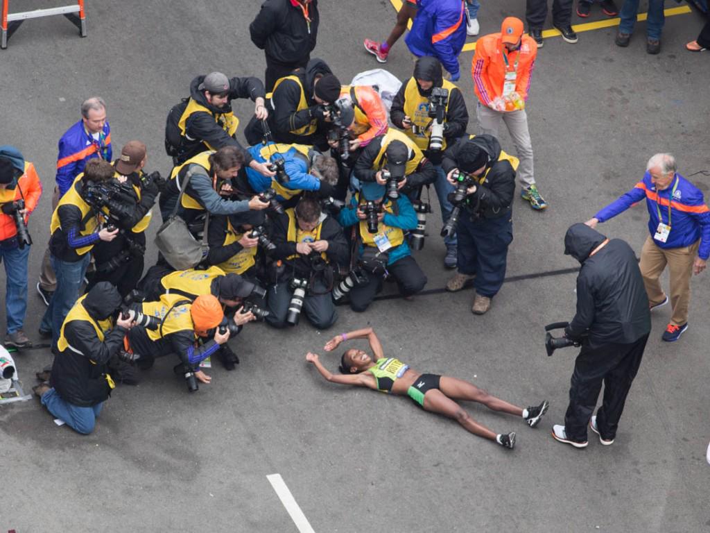 TaylorReports's tweet photo. The winner's circle! # Rotich #MediaCircle #BostonMarathon @BUNewsService photographer @thepankajkhadka http://t.co/di0AqgTeoU