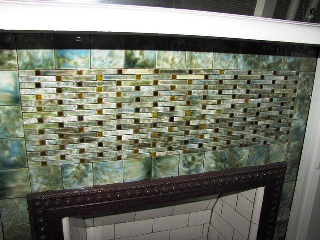 VisteNews's tweet photo. Radical tiles can transform your fireplace! http://t.co/IDOk4iFFcW #homeimprovement http://t.co/b5Ij3bwL38