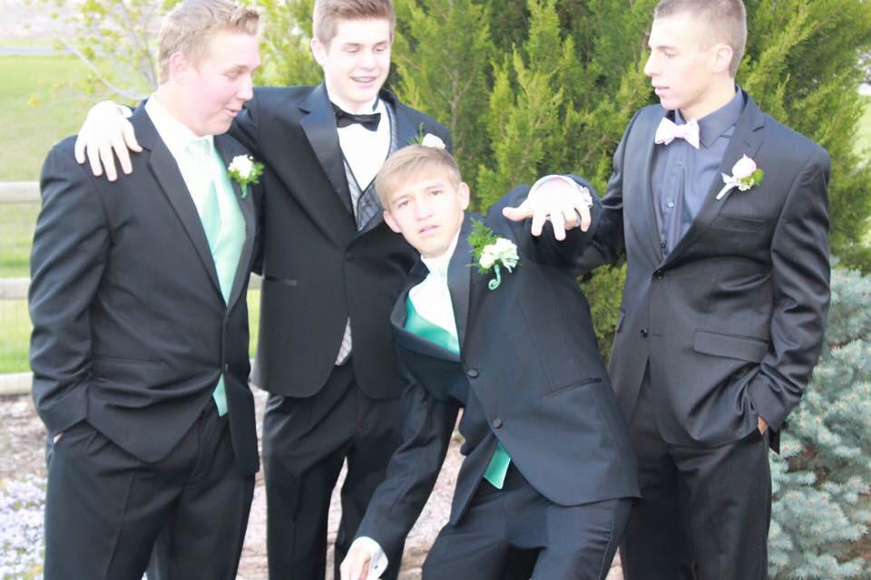 "dane what are you doing we're trying to take a nice picture"