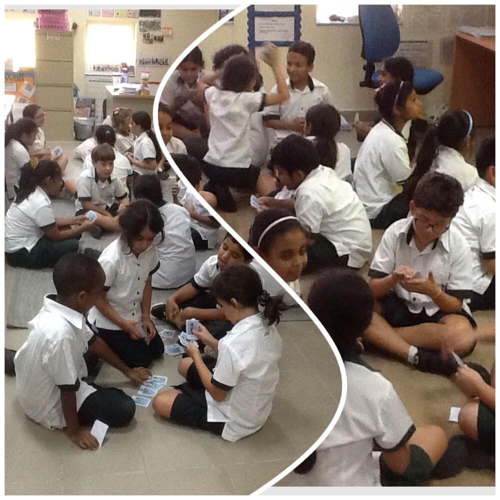 DIS_MFL's tweet photo. Year 4s go fishing... Practising family &amp; colours by playing "Sept Familles" http://t.co/1j7GPHJD5K
