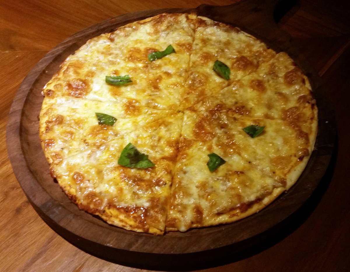 Foodaholix's tweet photo. Margherita Pizza at Komatose #Hyderabad http://t.co/Z3srNcbrRW @FoodBloggerAI @foodfood @lokeshwari9 @HyderabadFoodie http://t.co/07cgyS5QOl