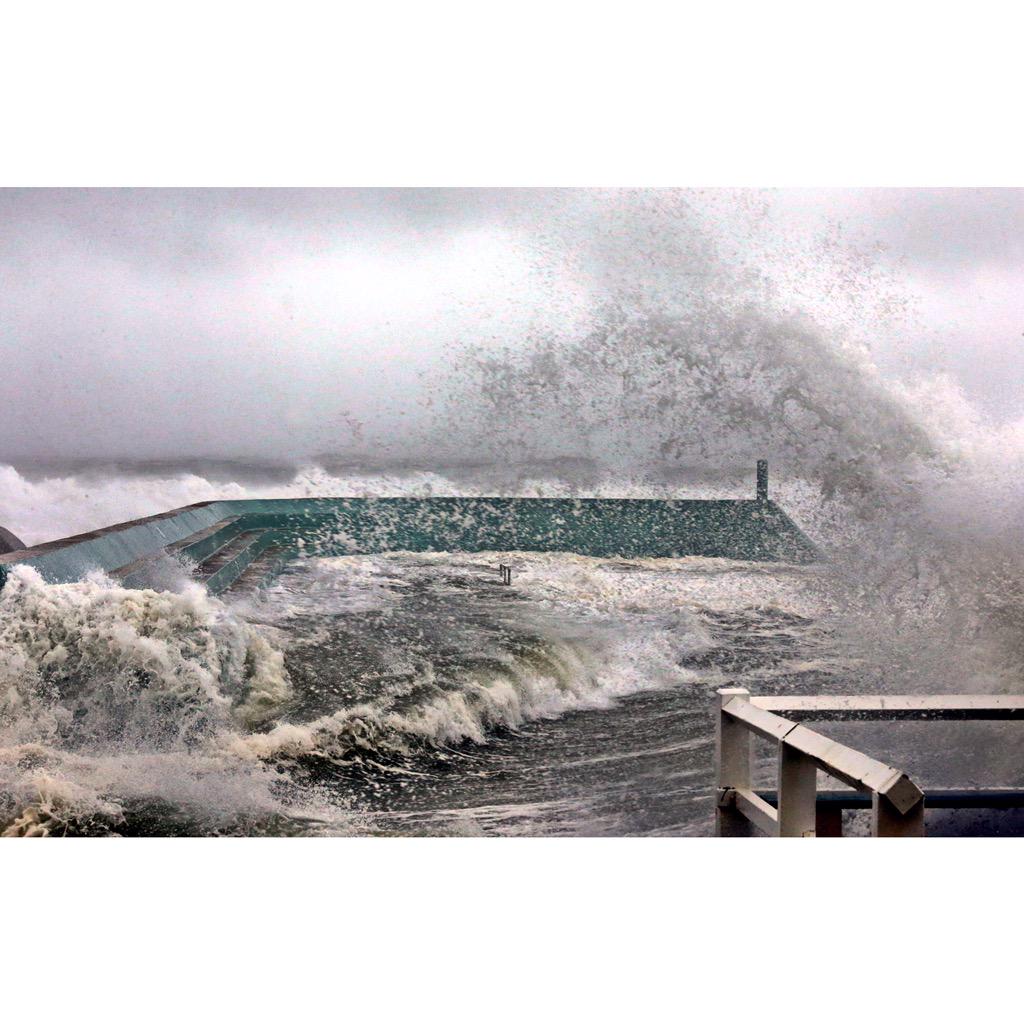Large seas tear through the normally serene Newcastle Ocean Baths late this afternoon. #newcastle #newstorm