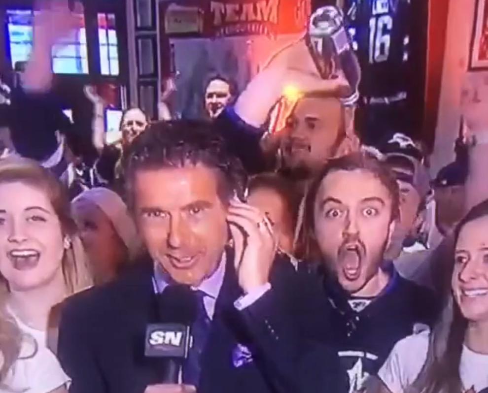 BleacherReport's tweet photo. VIDEO: Winnipeg Jets fan pours an entire beer on his head during a live broadcast http://t.co/zHtI1GqMM8 http://t.co/RuQ7gcE7rm