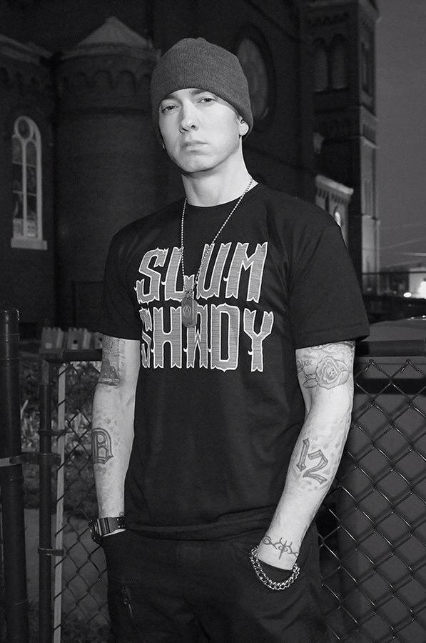 SlimShadyFans's tweet photo. New Pic: @Eminem wearing the official Slum Shady design tee. http://t.co/c9iu42hs2b