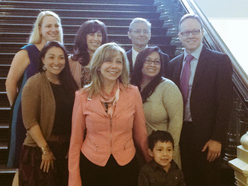 TXChildrensGR's tweet photo. @joanhuffman with @TexasChildrens surgical team and Mata family after she honored them on the Senate floor #txlege http://t.co/v6tnPWo5hy