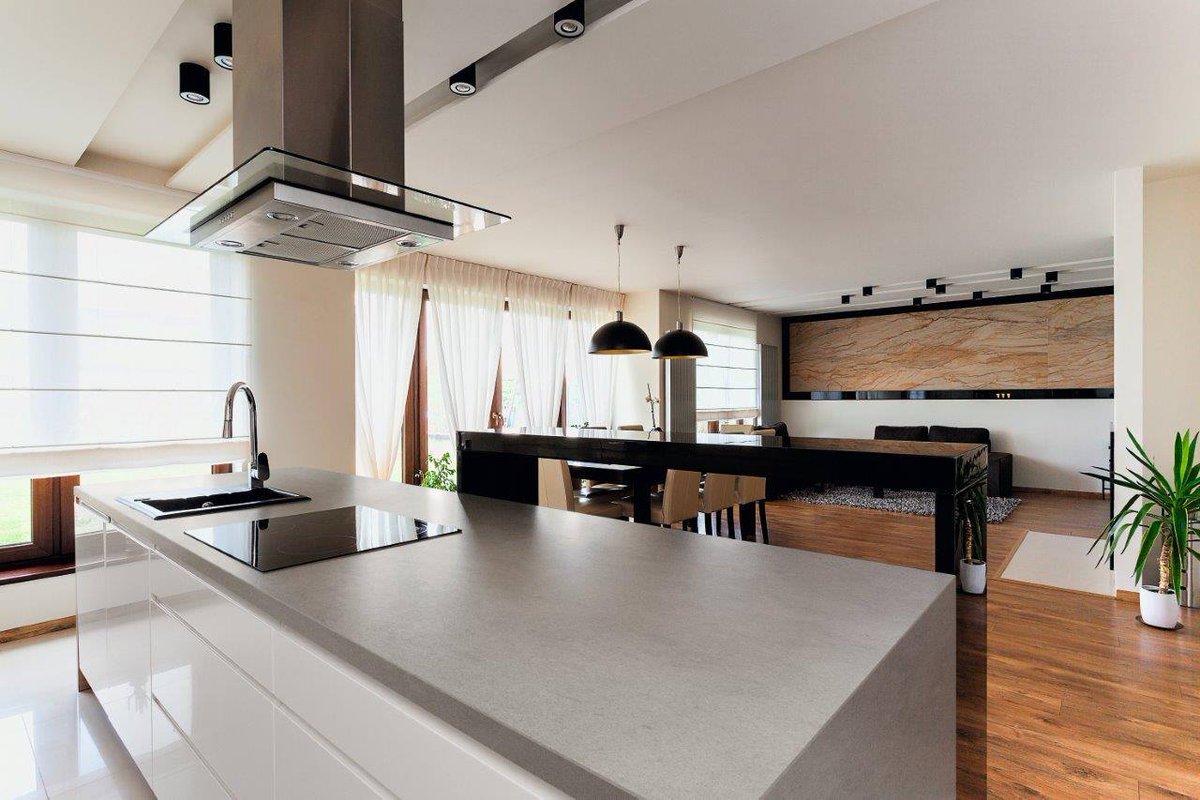 ¡El porcelánico y su uso más allá de paredes! Isla de cocina con encimera efecto cementoso Hydra Plomo by Techlam.