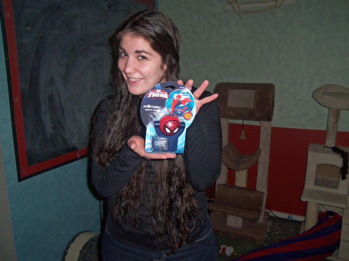 mikeh858's tweet photo. @QuiBids Here is a picture of my fiancee with a spiderman night light i won for 1 voucher bid. Came w a gameplay too http://t.co/XGK9fvnqwZ