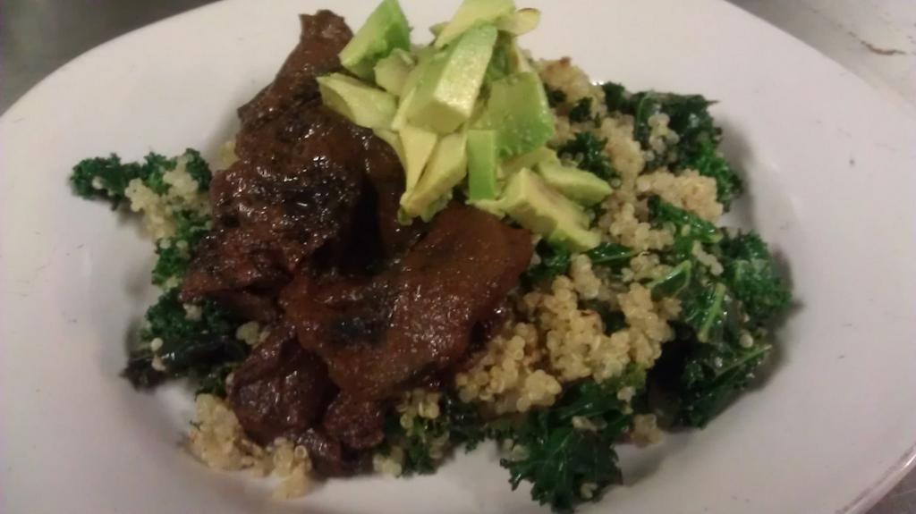 Braised portobella over  quinoa &amp; kale,topped With limed avacado,served With CHEF WILLs BeeSting Sauce..