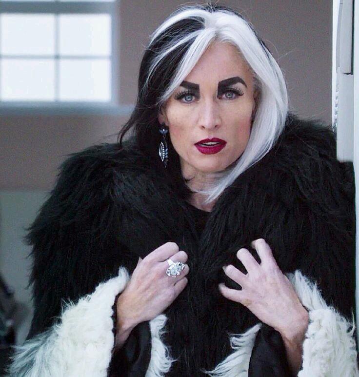 Isadora pulls out the picture of Cruella from her pocket with a soft sigh.