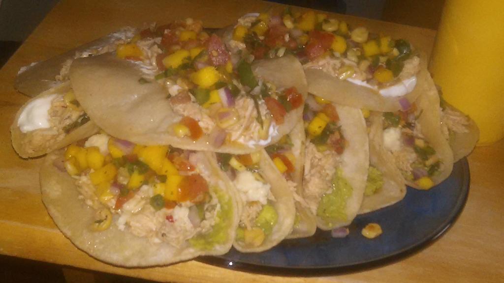 susanneeman's tweet photo. I just ate a plate of 15 tacos. I'm stuffed. I wish someone would rub my belly for me then feed me dessert.  :) http://t.co/byNI5PqwdR