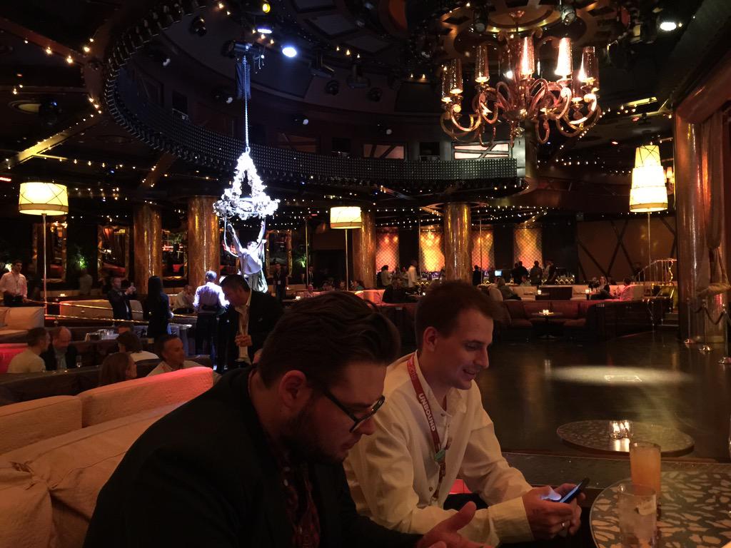 JoshuaSWarren: Woman hanging from ceiling pouring champagne but @Creatuity teammates using JIRA mobile #ImagineCommerce #dedication http://t.co/NU7IIu9uX7