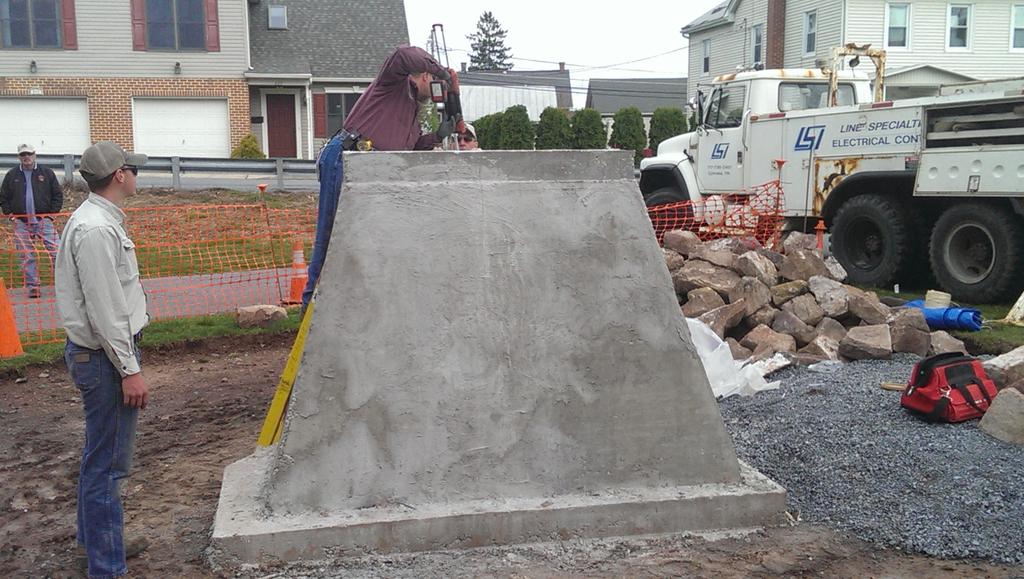 LarryLNP's tweet photo. Placing epoxy into holes in base to lock the bolts securing the Winters statue. http://t.co/dtb7EOHiMx