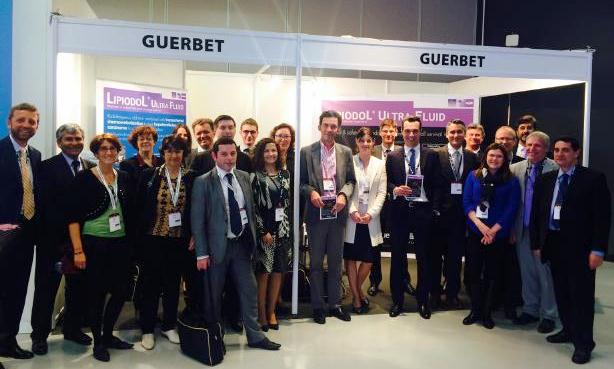 GuerbetGroup's tweet photo. All the Guerbet team on the booth with Jean-Pierre Pelage & Audrey Fohlen, radiologists in Caen, France. #ECIO2015 http://t.co/XfF3OyMc5R