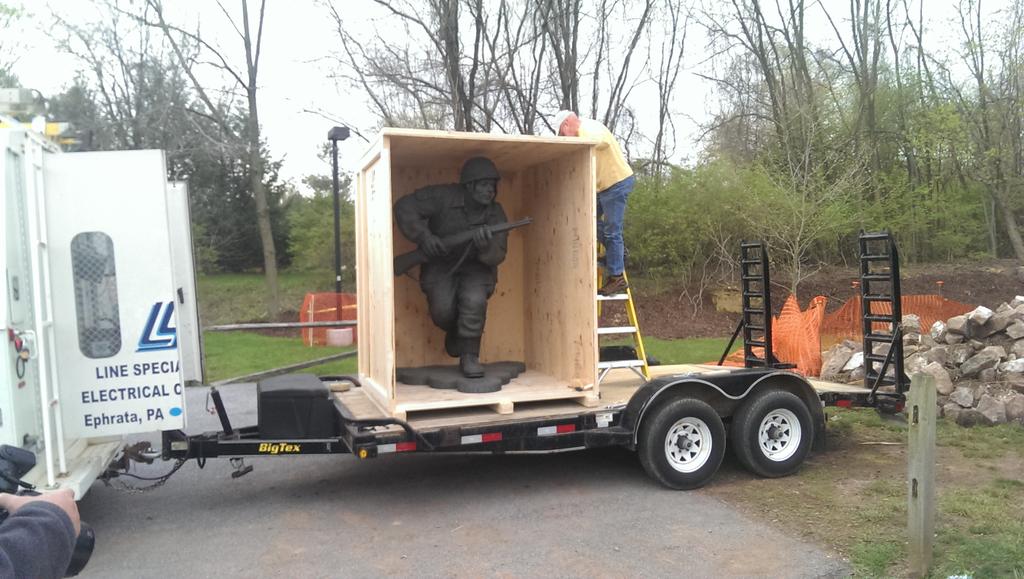 LarryLNP's tweet photo. Opening the crate prior to lifting Winters statue. http://t.co/gvq4P1Ei3k