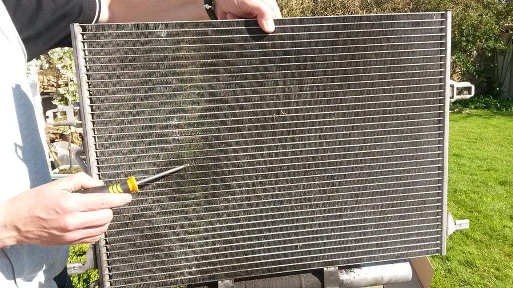 AUTOAC2's tweet photo. Condenser had a leak on the inside of the coil, next to radiator.  Not easy to pinpoint.Diagnostics to clear code. http://t.co/TCq6fZKUMg