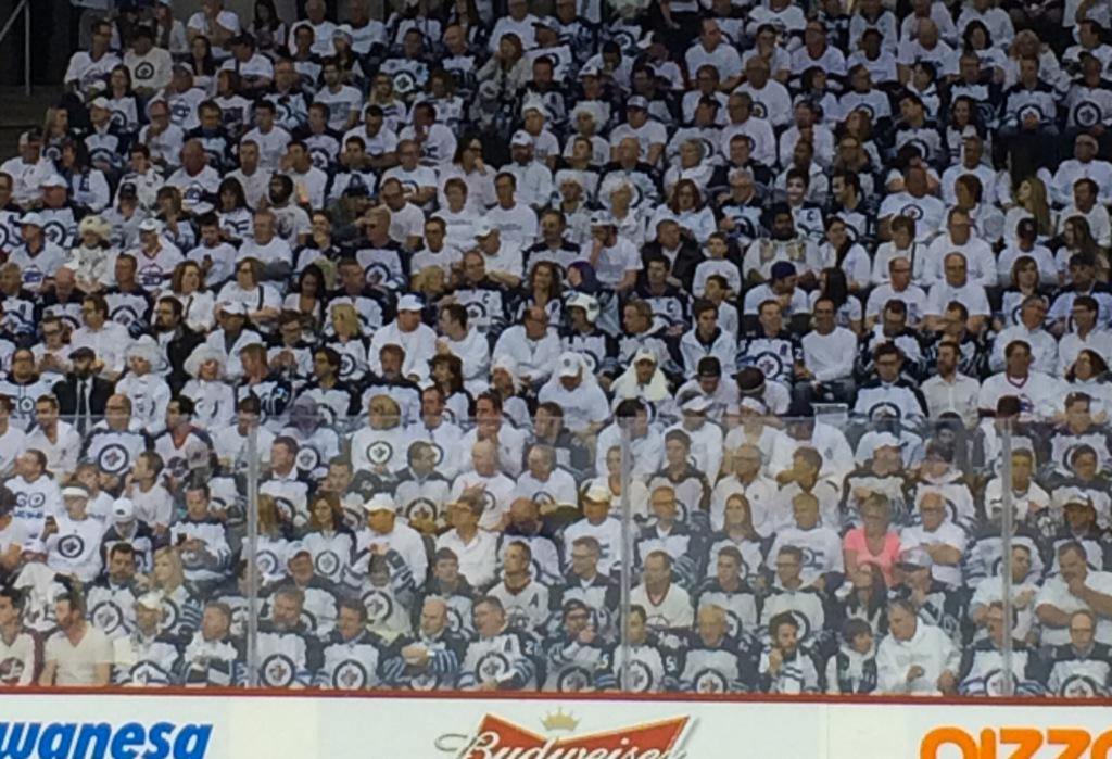 It appears the lady in pink may have missed a memo. #GoJetsGo