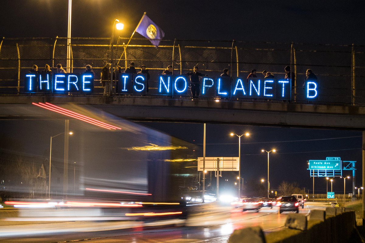 OLBLightBrigade's tweet photo. .@350 We're reminding drivers 2night that we don't get any second chances with our planet #EarthDay @OccupyWallStNYC http://t.co/LFgg7N63ZK