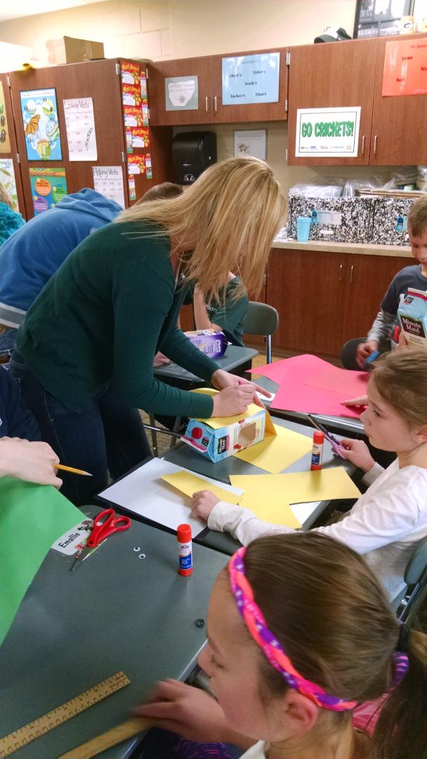 KateH20FC's tweet photo. My senior's last project with their 3rd grade buddy's...juice box bird feeders http://t.co/Q5JR9UtKD2