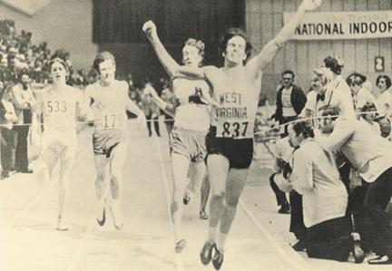FBT- WVU's Mike Mosser shown Winning the NCAA Indoor 1000 yard title in 2:08.9-Detroit-1972  fotaf.com/mosser1972.jpg