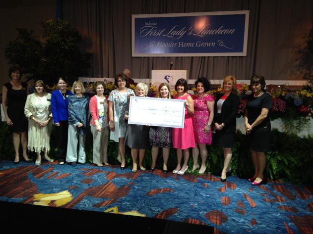 FirstLadyIN's tweet photo. It's my extreme honor to present this check to @feedINshungry for $65K-along with a big THANK YOU! #HoosierHomeGrown http://t.co/NTiU5PAPKE